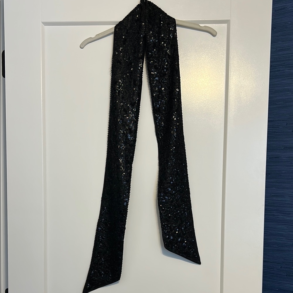 Worth black sequined scarf with 100% silk backing EEEUC. size petite